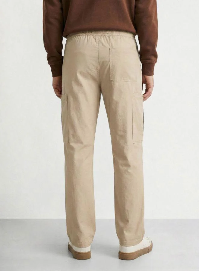 The Indian Garage Co Men Relaxed Fit Solid Patch Pocket Mid-Rise Cargo Trousers